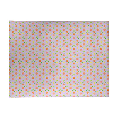 Tapis de fruits mauves agrumes