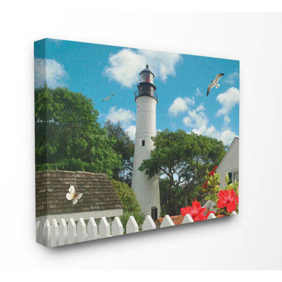 " Key West Light House With Picket Fence Butterfly And Seagull " by Alan Giana & Company