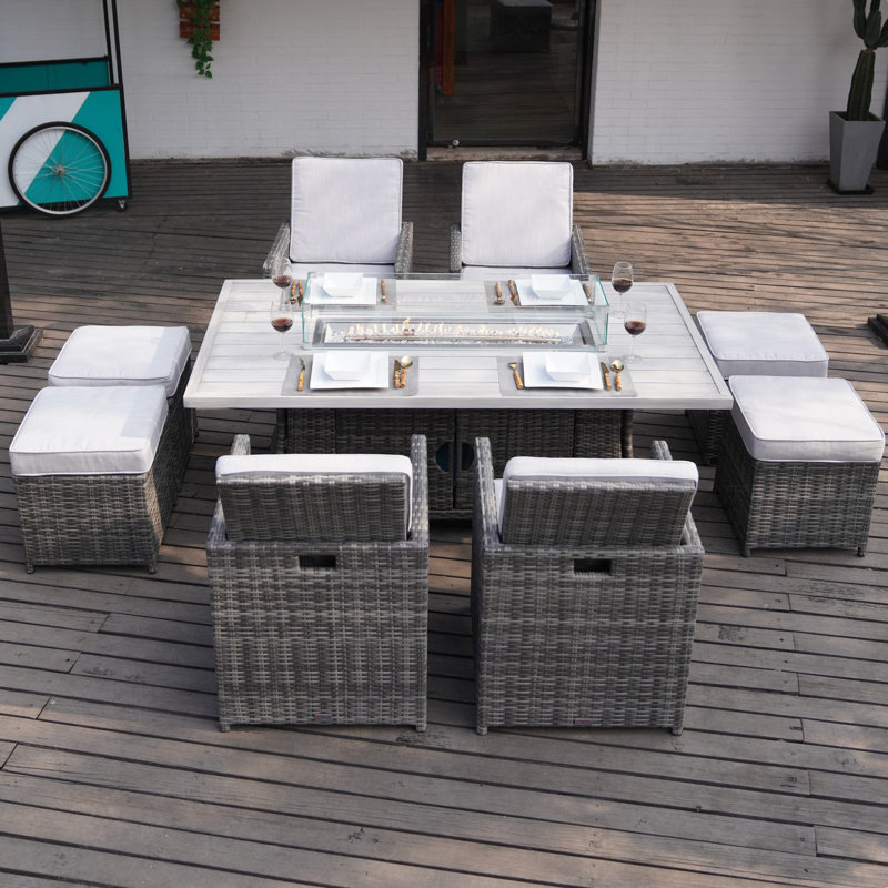 Bentlei 8 - Person Wicker Patio Dining Set with Rectangular Table , Cushions Included