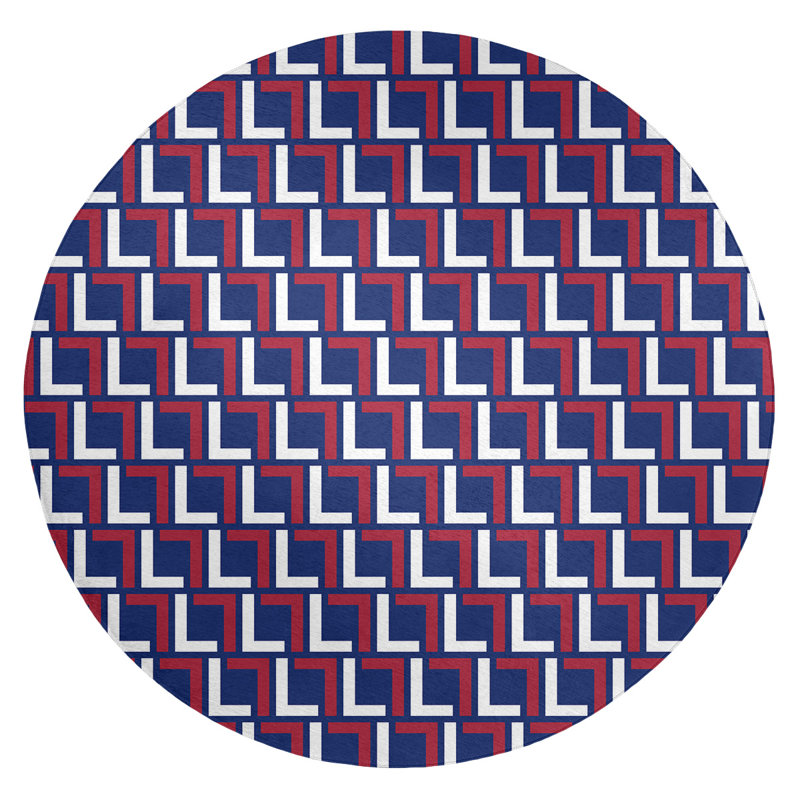 Tapis rond bleu / rouge à motif géométrique