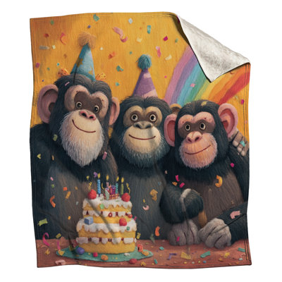 Singes avec des couvertures de gâteau d'anniversaire