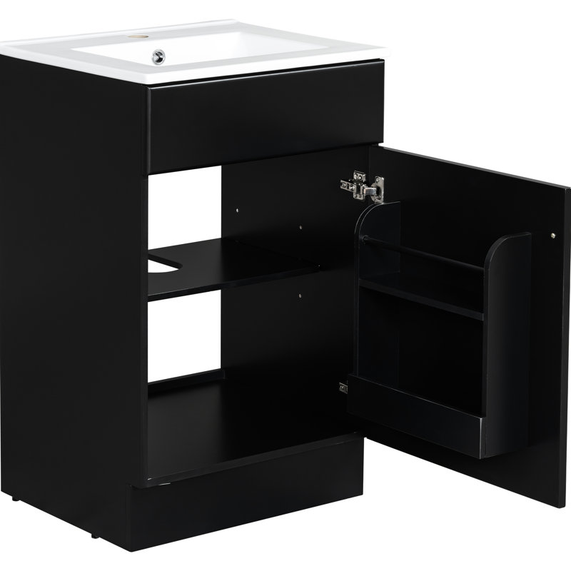 Meuble-lavabo noir de 20 po. Armoire avec lavabo en céramique. Couvercle de trop-plein lisse et cercle en métal. Tablette de porte et tablette réglable. Conception pratique du meuble-lavabo. Finition à l'eau.