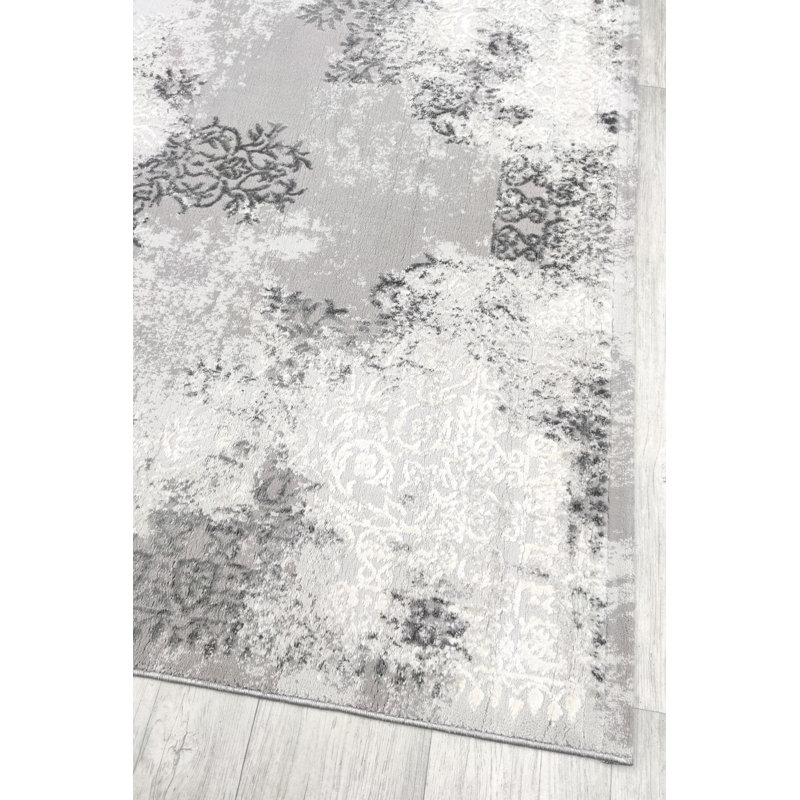 Tapis rectangulaire gris en polypropylène tissé à la machine 6 pi 7 po x 9 pi 6 po