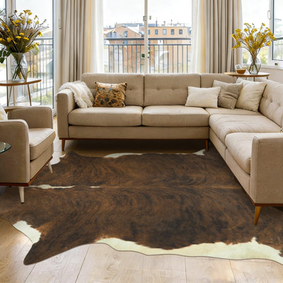 Faux leather animal print area rug for indoor use, suitable for living rooms, bedrooms, and studies.