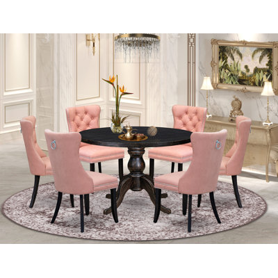 L'ensemble de salle à manger 7 pièces se compose d'une table ronde de 48 po avec piédestal et de 6 chaises rembourrées beiges rouges, noir sablé