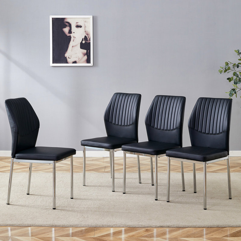 Mai de 4 chaises de salle à manger en polyuréthane noir à haute résilience avec pieds en métal argenté, conception à rayures verticales, bonne capacité de soulagement de la fatigue