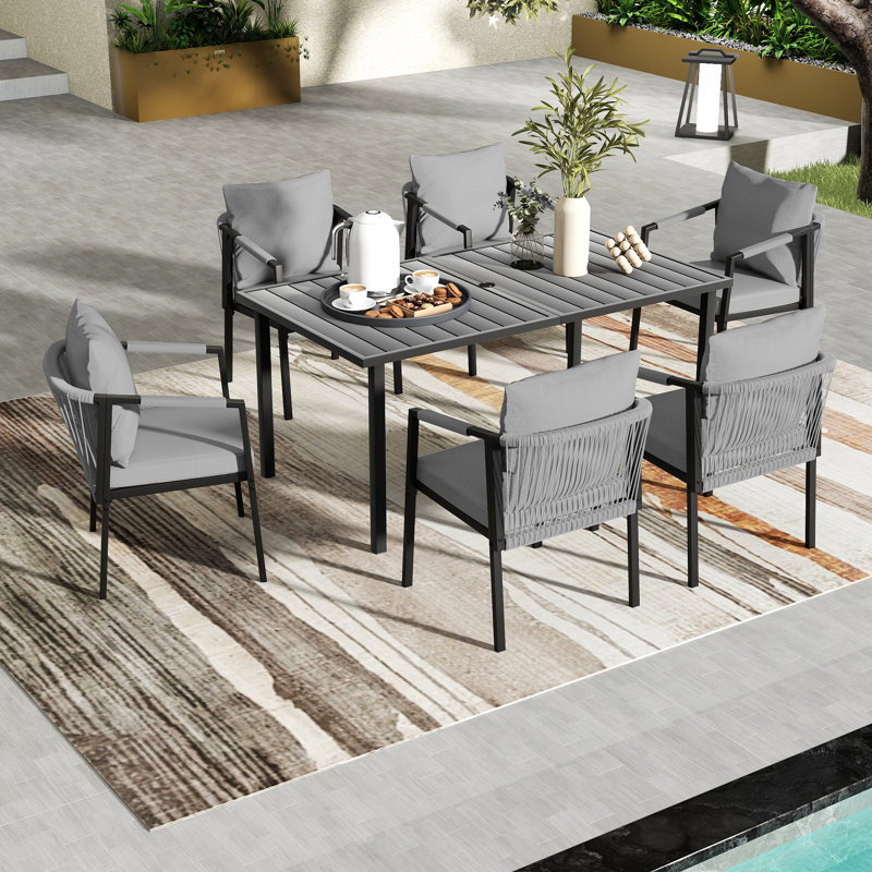 Maurice 7-Piece Hand-Woven Rope Patio Dining Set With Gray Cushions And Umbrella Hole