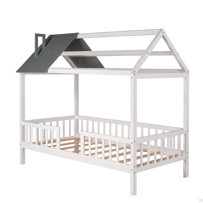 Lit simple en bois avec clôture