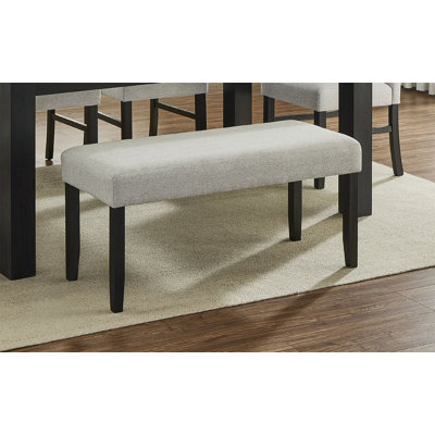 Banc de salle à manger rembourré avec rembourrage confortable et conception moderne peu encombrante pour un usage quotidien.