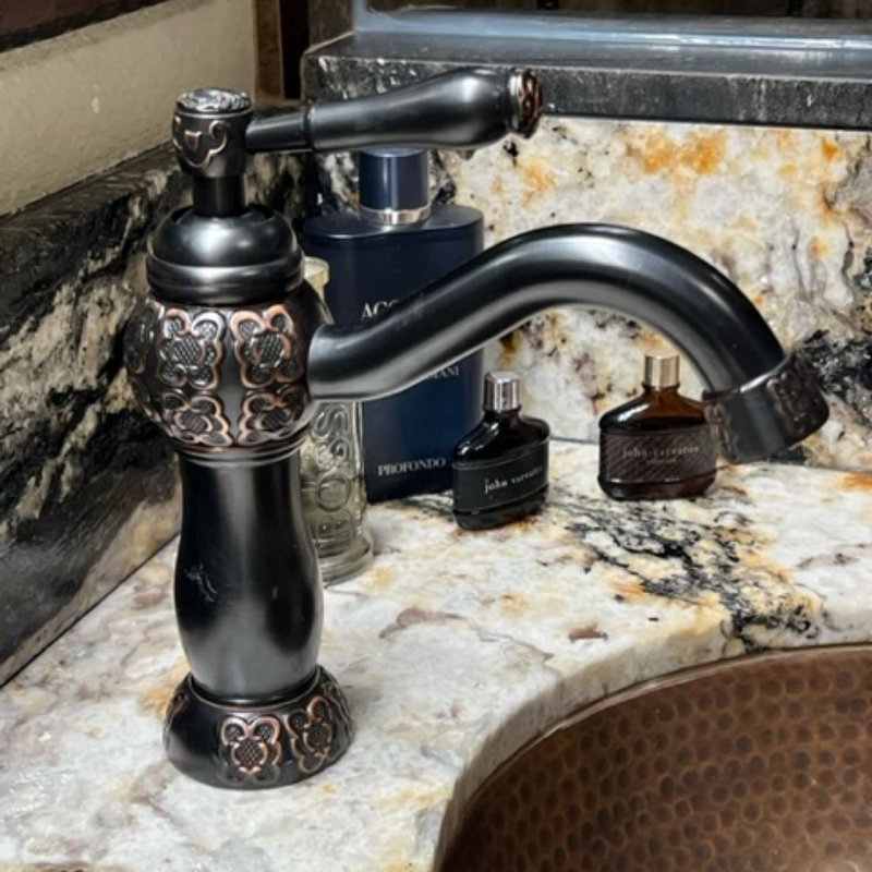 Clayborne 9" Oil Rubbed Bronze Bathroom Faucet with Copper Design