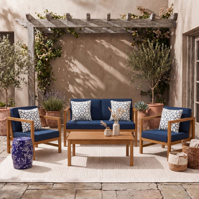 Soguda 4 - Person Patio Conversation Set with Cushions