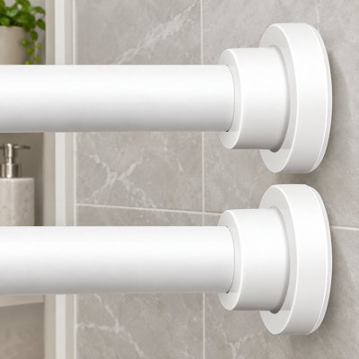 This 2 pack of white tension curtain rods adjusts from 32-66"; a strong spring and non-slip ends provide a stable, secure hold, while the no-drill, no-tools design is sag-resistant and waterproof for windows, showers, and closets.