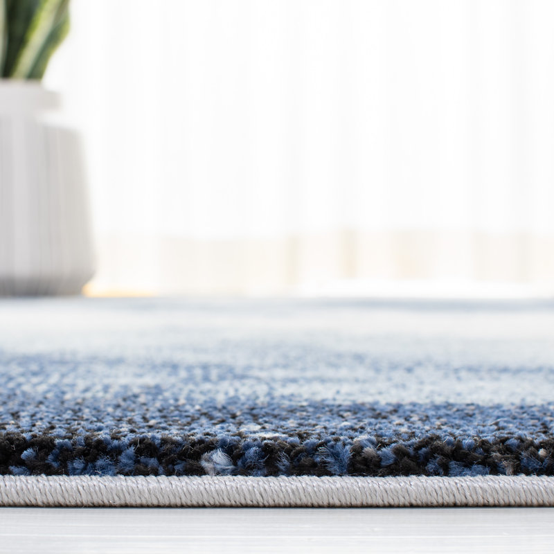 Handmade Blue Rectangular 4' x 6' Synthetic Rug