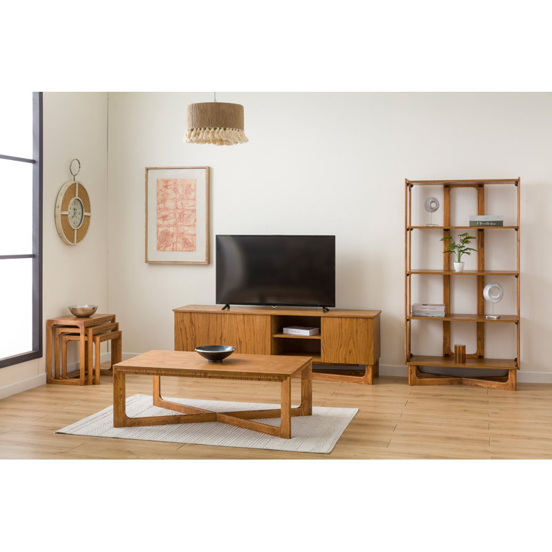 Table basse ronde en verre avec base géométrique dorée