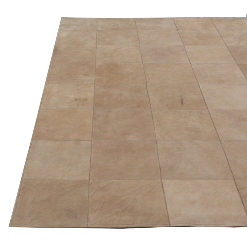 Cowhide Geometric Area Rug in Beige