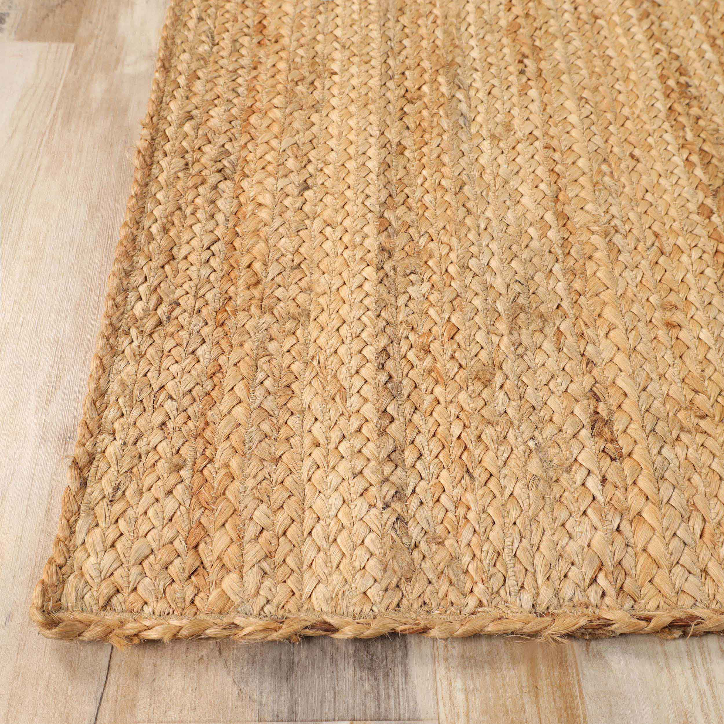 https://assets.wfcdn.com/im/43311215/compr-r85/2501/250115865/shreya-demuth-reversible-hand-woven-natural-braided-jute-indoor-area-rug.jpg