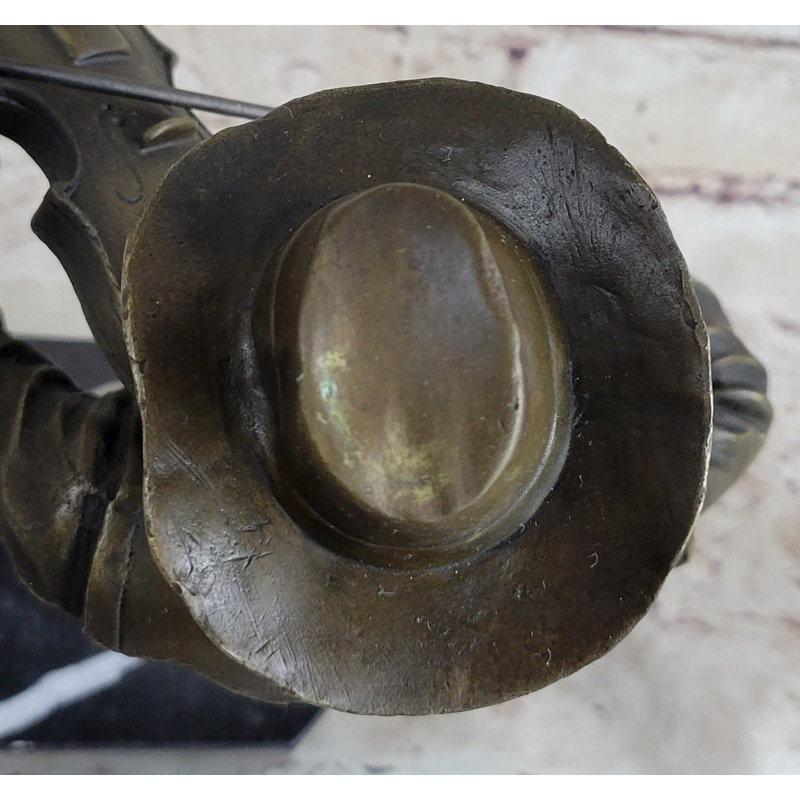 Figurine de cowboy jouant du violon