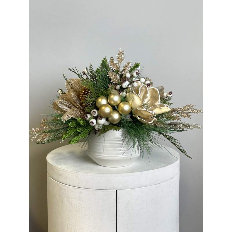 Magnolia Arrangement With Greens And Pine Cones