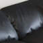 Chaise avec accoudoirs avec repose-pieds noir en cuir véritable avec repose-pieds