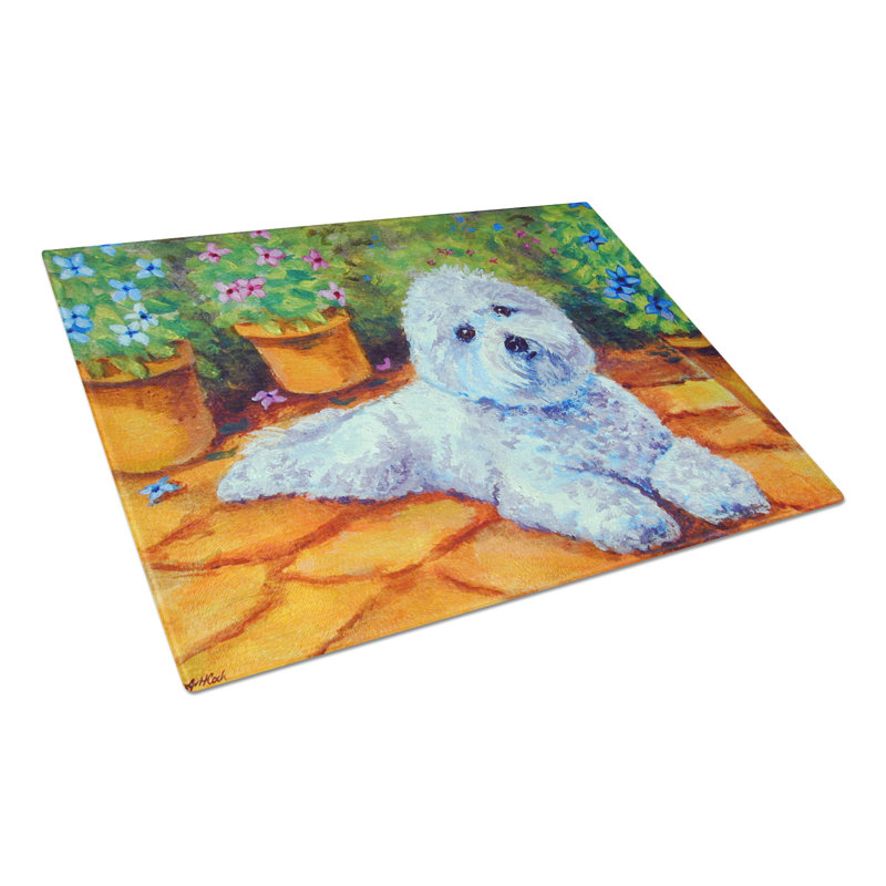 Planche à découper en verre de Winston porter Bichon frisé sur le patio