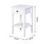 Table de rangement blanche sur pied avec table de chevet et table de chevet blanche
