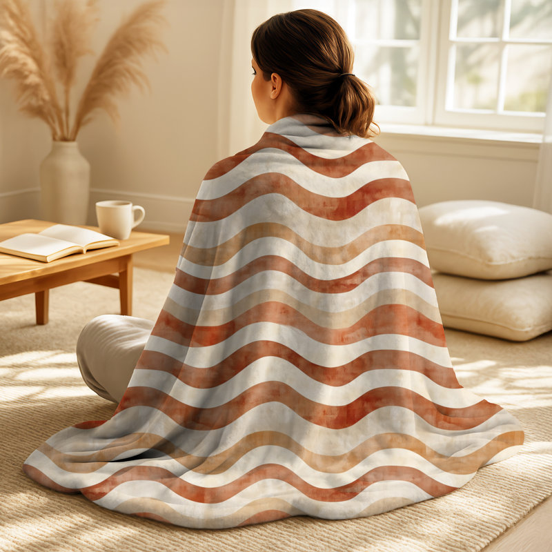 Coussin orange, orange et brun