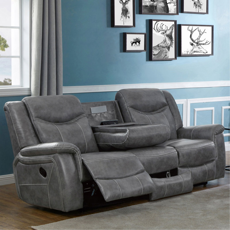 Canapé décontracté gris avec accoudoirs coussinés