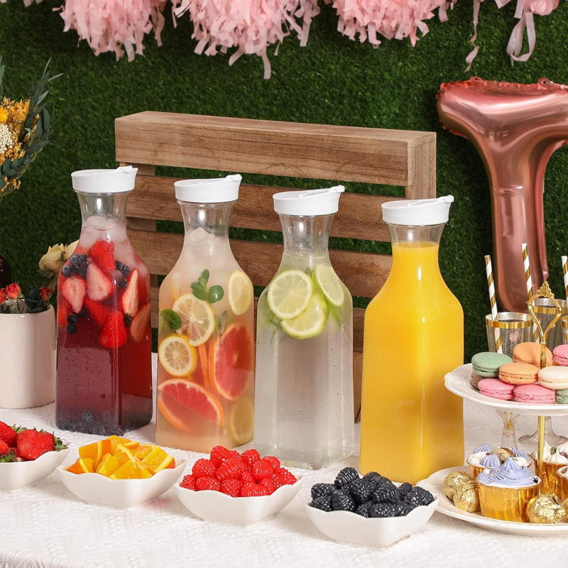 Carafe à eau en plastique avec couvercle à couvercle rabattable carafe à jus de fruits en plastique transparent