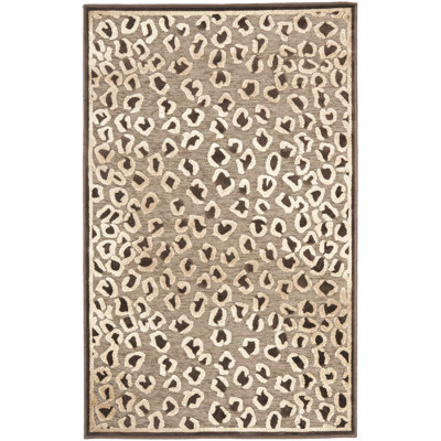 Avera Animal Print Chenille Hand Woven Area Rug