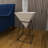 White Wood Inverted Geometric Accent Table with Black Metal Stand