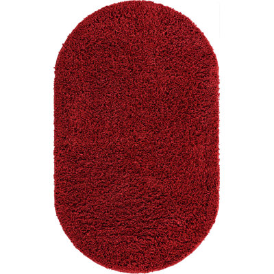 Tapis à poils longs Ashmita de couleur rouge ambre