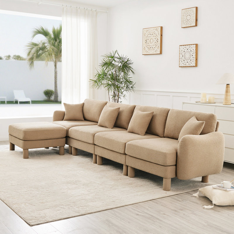 Canapé convertible en tissu Boucle avec accoudoirs distinctifs et repose-pieds amovible, pieds cylindriques enveloppés de tissu d'ameublement