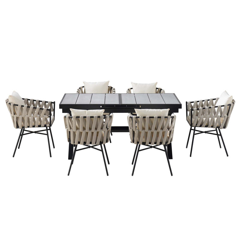 Discover Unmatched Flexibility In Alfresco Dining With Six Creatively Arranged Chairs Made Of Polyester Woven Tape And A Table That Expands From 62.9 To 82.6 Inches To Suit Any Occasion.