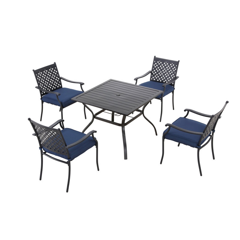 Ensemble de salle à manger 5 pièces en métal pour l'extérieur avec chaises à dossier en treillis et coussins bleus