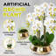 Faux orchidée dorée dans un pot de fleurs en céramique décor blanc élégant