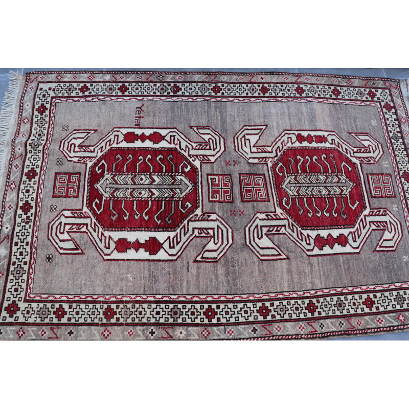 Tapis turc Scorpion tissé à la main dans des motifs géométriques rouges éclatants