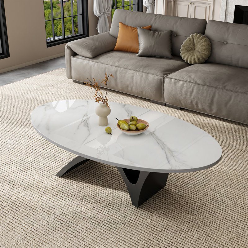 Table basse ovale moderne de 125 cm (49,2 po), plateau en pierre frittée imitation marbre, piètement minimaliste en métal sculptural, montage facile