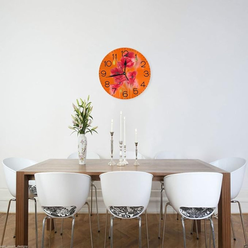Horloge murale ronde à motif floral en acrylique sur fond orange