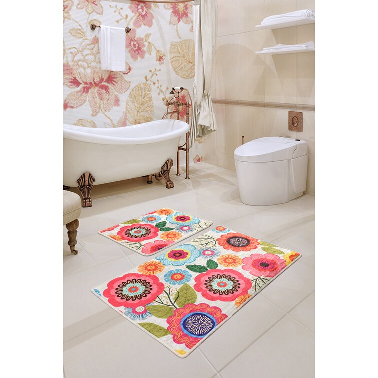 https://assets.wfcdn.com/im/43384941/resize-h755-w755%5Ecompr-r85/9039/90398920/Bade+Bath+Rug+with+Non-Slip+Backing.jpg