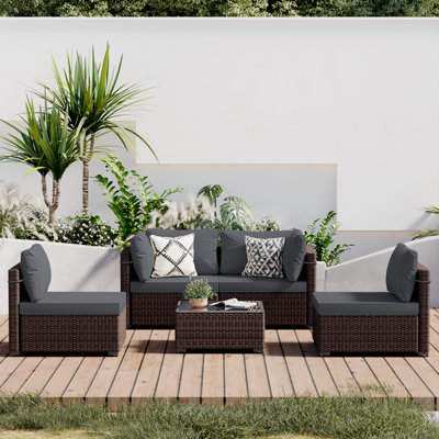 Corinne Premium All-Weather Wicker 4 - Person Modular Patio Conversation Set with Cushions
