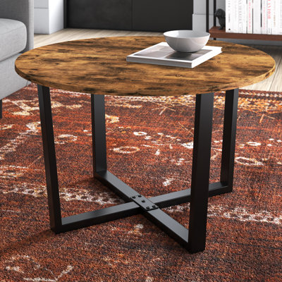 Table basse à pieds croisés