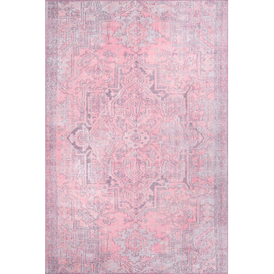 Tapis rose à motif tissé rétro