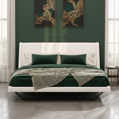 King-Sized Upholstered Platform Bed Covered In PU Leather, Featuring A Wave-Like Curved Design And Trapezoidal-Shaped Legs. No Box Spring Needed. Color: White.