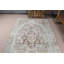 Explorez la beauté de ce grand tapis turc vert parfait pour votre salon ou votre salon