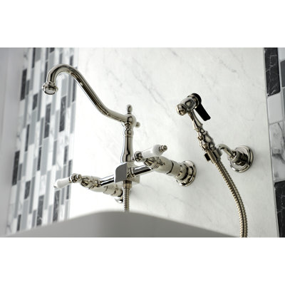 Kingston Brass Heritage Double-Handle 3-Hole Wall-Mount Bridge Kitchen Faucet with Brass Sprayer