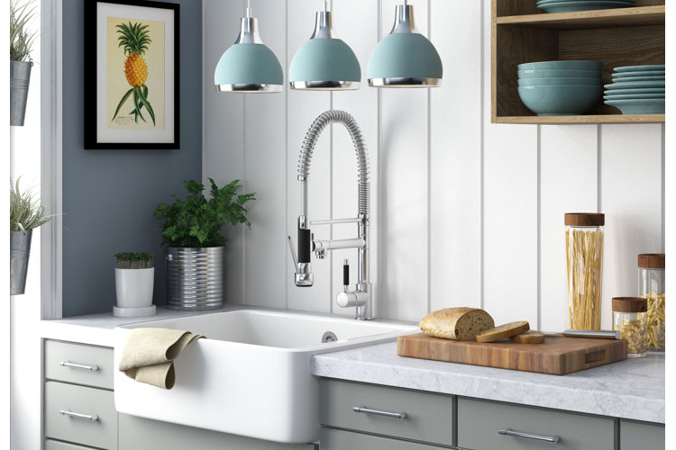 modern coastal kitchen with gray cabinets, marble countertops, and white shiplap walls