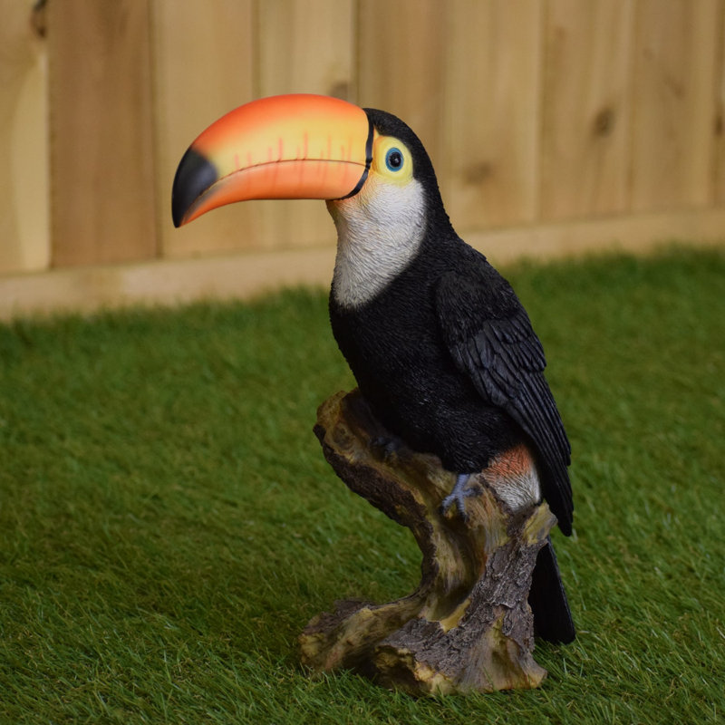 Figurine toucan on souches