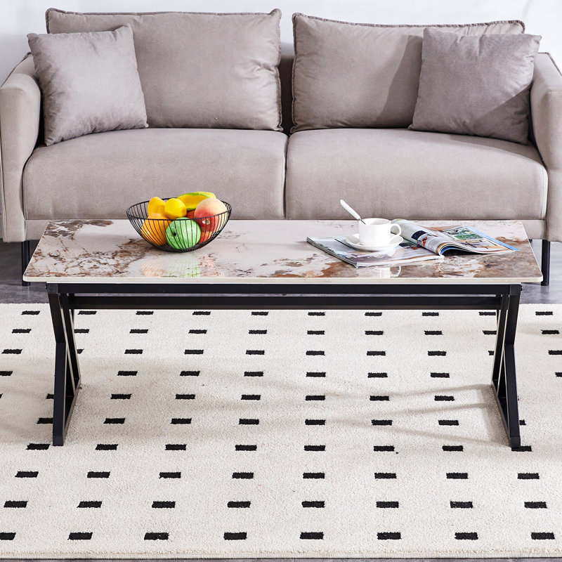 47*23.6 A Coffee Table Is Made Of Rock Slab Material, With A Natural And Smooth Marble Pattern On The Surface, Which Complements The Modern Design Of The Metal Legs And Adds A Touch Of Fashion