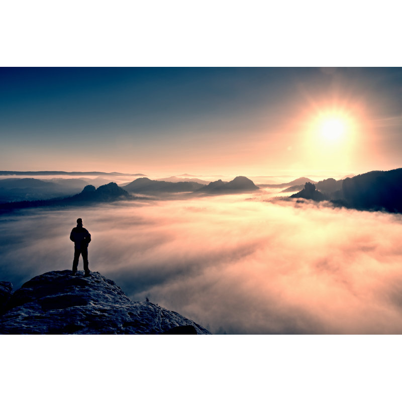 Man On Peak Of Rock by Rdonar - Wrapped Canvas Print, 30cm H x 46cm W