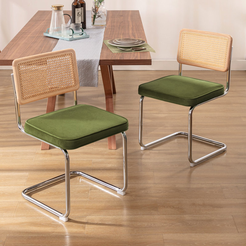 Crumley 47.8cm Dining Chair with Natural Rattan Backrest, Upholstered Seat and Steel Frame, Chrome / Green Velvet